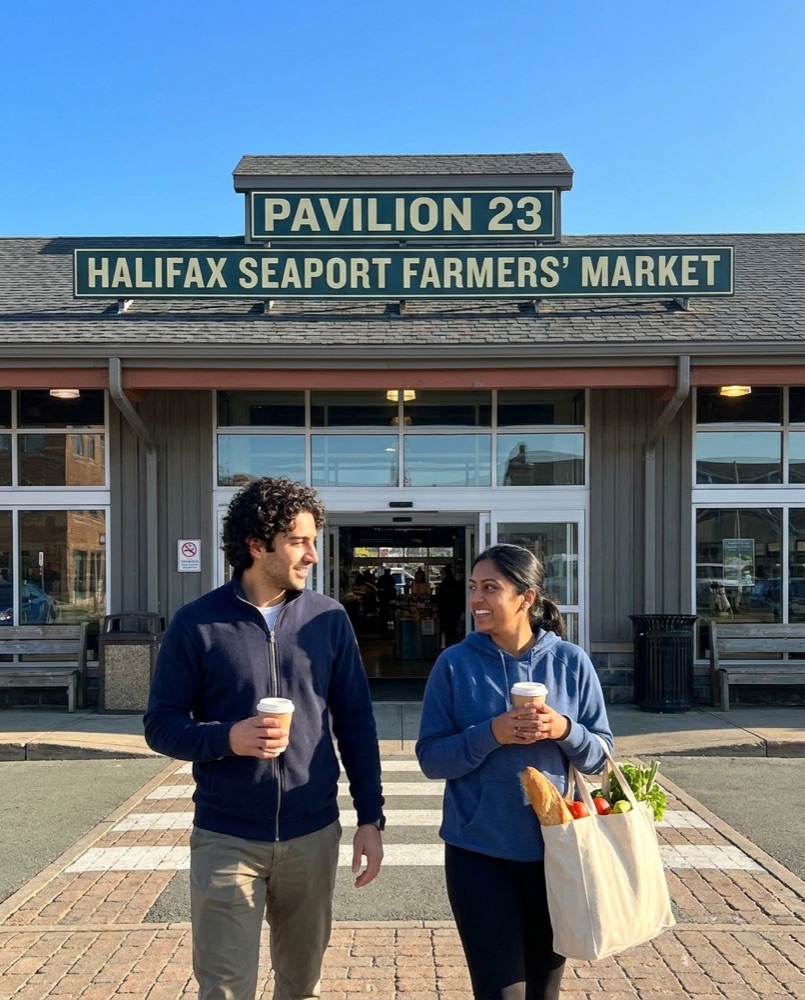 Two friends leaving the Seaport Farmers' Market